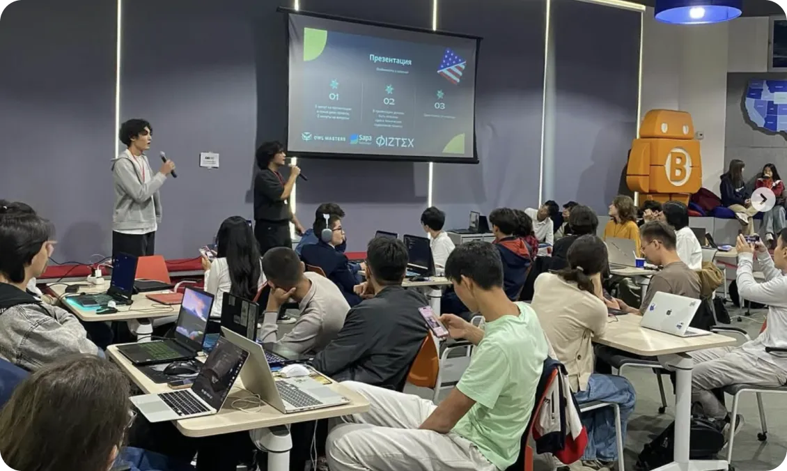 Participants working together during an earlier Devtx technical event